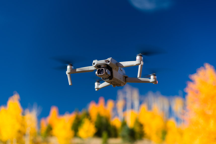 Dji mavic drone flying in the fall.