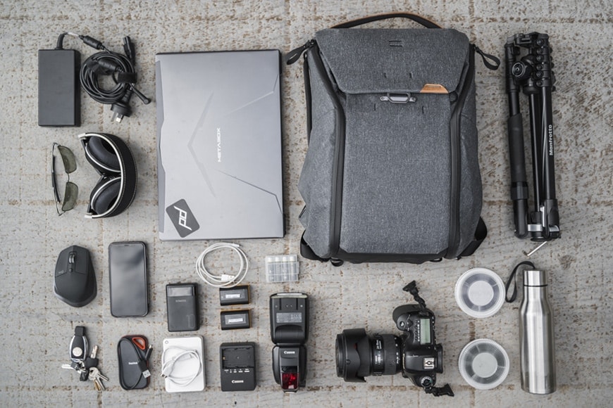 You'll be able to fit a full size DSLR camera in to the 20L Everyday Backpack V2 along with the rest pictured here.