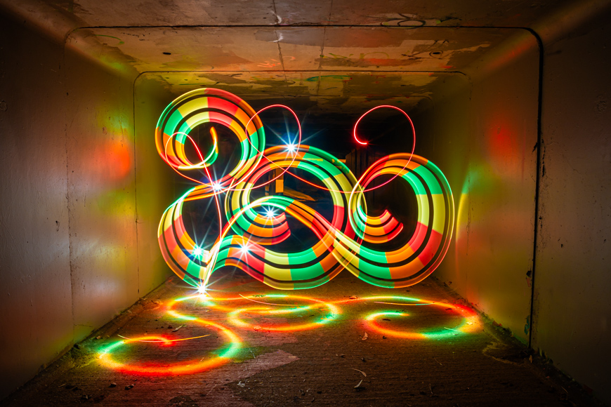 A light painting in a tunnel.