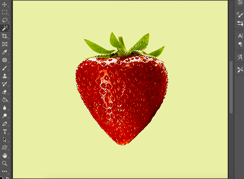 A photo of a strawberry in adobe photoshop.